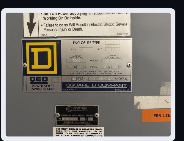 Switchboard nameplate showing 3 phase 3 wire designation